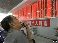 Man watching shares index in China