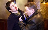 Ray punches Russ