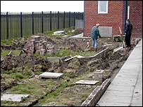 Volunteers from Eureka laying bricks