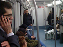 Using a mobile on the Metro in Barcelona