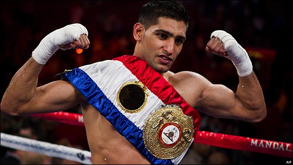 Amir Khan celebrates his victory