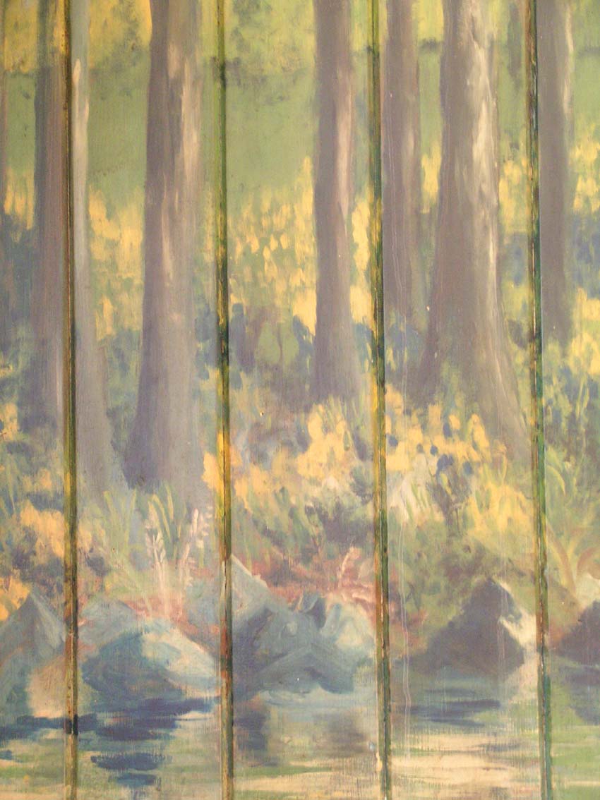 Tall wooden things with leaves upon them. What could they be?