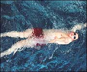Swimmer showing off his backstroke
