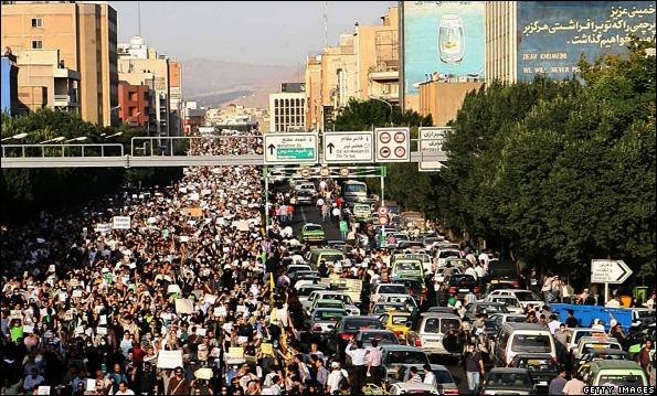 Iranians taking part in a rally supporting Iranian opposition leader, Mir Hossein Mousavi, in Tehran