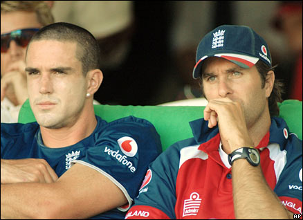 England's captain Michael Vaughan, right, and Kevin Pietersen watch on as his team was beaten by New Zealand by 189 runs