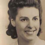 This was the photo I sent to my husband who was serving in the RAOC overseas. The badge I am wearing is an RAOC badge which I wore as a memento of my husband. This was in 1944.