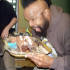 Mr T gets to grips with a chocolate cake.