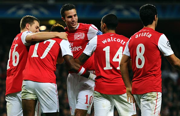 Van Persie celebrates with his team-mates. Photo: Getty