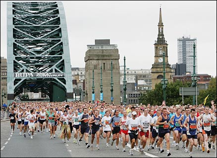 Competitors run over the Tyne Bridge during The Bupa Great North Run