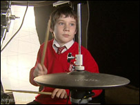 Boy playing drums