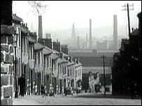 Bradford terraced houses, chimneys and hill