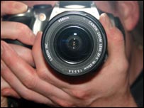 Person holding camera