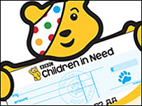 Pudsey with cheque