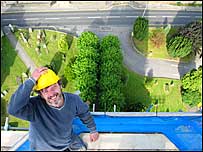 Foreman Martin Buckler grabs his hat