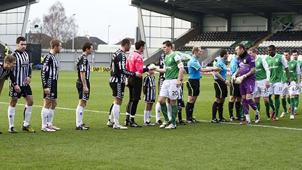 The St Mirren and Hibs players shake hands before their league match in February, perhaps to introduce themselves to one another... Photo: SNS.