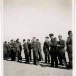 Officers and Sergeants ‘Parade’ coming up to our mess to serve our Christmas dinner 1942