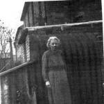 Sarah Harvey by the air-raid shelter