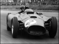 July 1956: British racing driver, Peter Collins racing a Ferrari in the Silverstone Grand Prix.