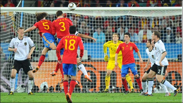 Puyol heads the winner for Spain