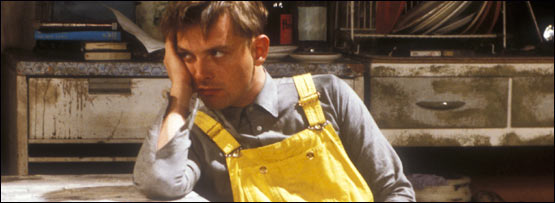 Ric Mayall in classic 1980s BBC series The Young Ones, looking bored
