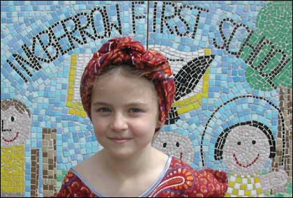 Pupil wearing African clothes from a recent visit