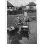 1st image is of Ralph tank driver with myself. February 1944 2nd image is of myself and my brother out to play. 3rd image is of myself showing my patriotic buttons. 4th image is of the whole Broomfield family.