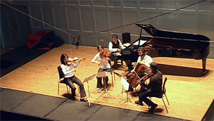 Orchestra players and Grand Piano
