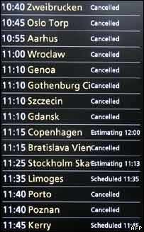 An arrivals information board showing flight cancellations is pictured at Stansted Airport, December 8, 2008, following a protest by the climate action group Plane Stupid. Leon Neal/AFP/Getty Images