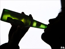 person drinking beer