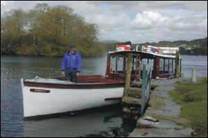 John with his boat Muriel