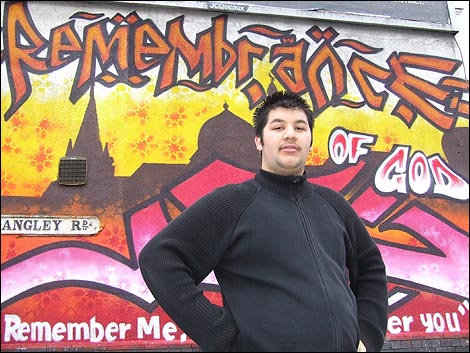 Ibrahim at Mohammed Ali's mural