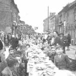 Edward Street, Dunstable, VE Day Tea Party - May 1945. Author, Mr A W Morgan is pictured on the right, just above the head of the Reverand (back to camera).