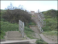 Climb the steps back up to where you started