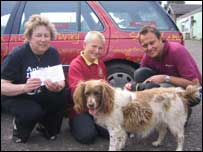 Jason Hardy presenting a cheque to Animal Lifeline