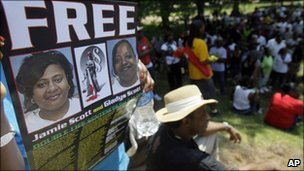 Photo shows a poster campaigning for the sisters to be released
