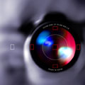Close-up image of a paparazzi photographer