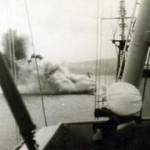 Moment of impact as HMS Saumarez hits mine in Corfu Channel, October 22, 1946. Spray still in air as the ship lists as she still moves lost 32 men T A Russell D/KX100469