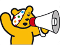 Pudsey Bear with a megaphone