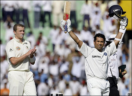 India's Sachin Tendulkar sets a new record for the most runs scored by a batsman in Tests