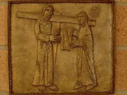 Veronica wipes his face