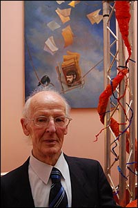 Ron Morris in front of Dr Bashir's painting