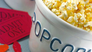 Cinema tickets with popcorn