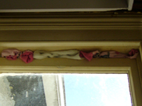 Socks used to cover up broken window