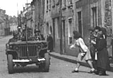 US jeeps and French civilians at Carentan, 1944