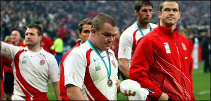 England players look dejected with their silver medals