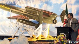 Iranian President Mahmoud Ahmadinejad delivers a speech during the unveiling ceremony of a long-range drone