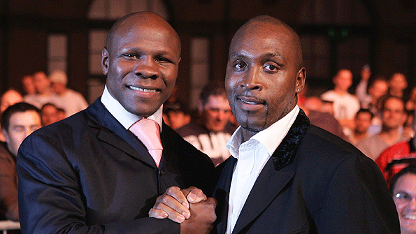 Chris Eubank (left) and Nigel Benn