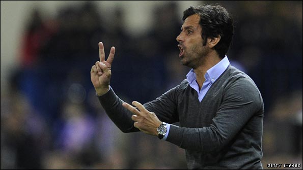 The impeccably dressed Quique Sanchez Flores