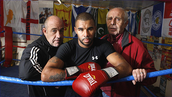 Rendall Munroe with trainer Jason Shinfield (left) and manager Mike Shinfield