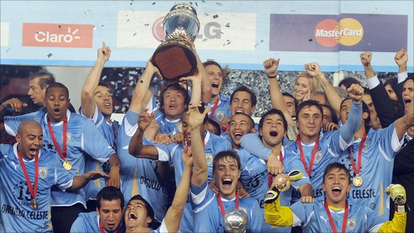 Uruguay's football team celebrate their Copa America victory.